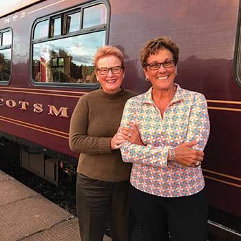 Drs. Francoise Lepage (left) and Denise Lucy (right) on the Belmond Train touring the Highlands of Scotland.